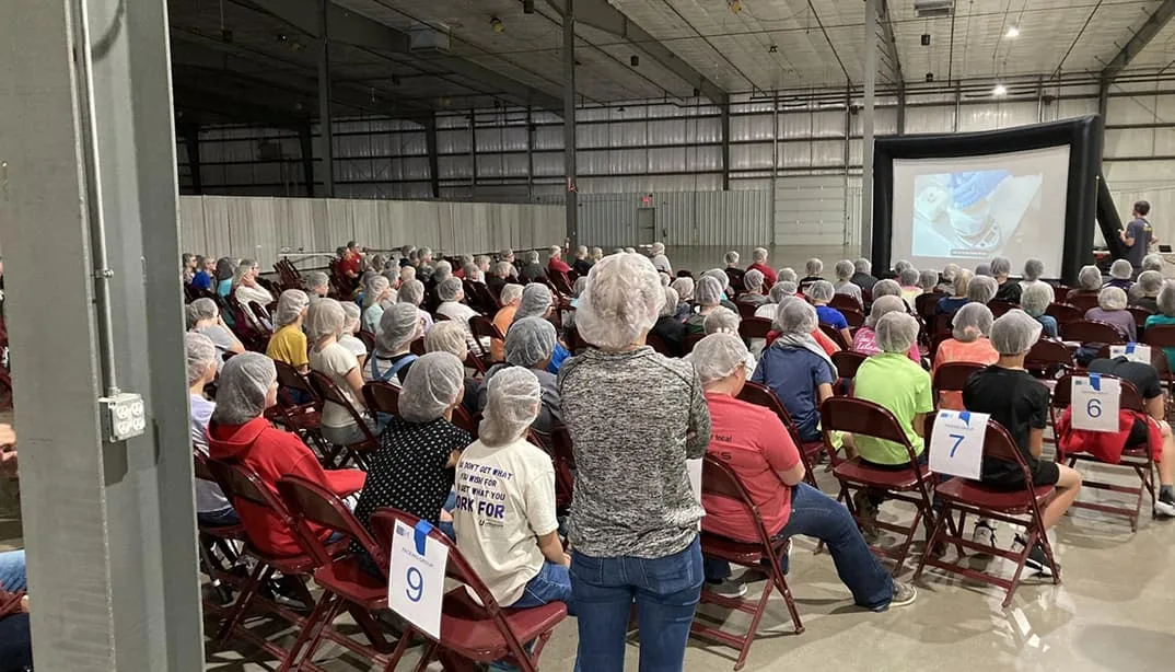 Audience viewing presentation in trade show space